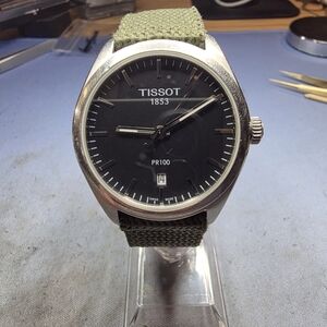 Tissot PR100 with Black Dial and Green Strap